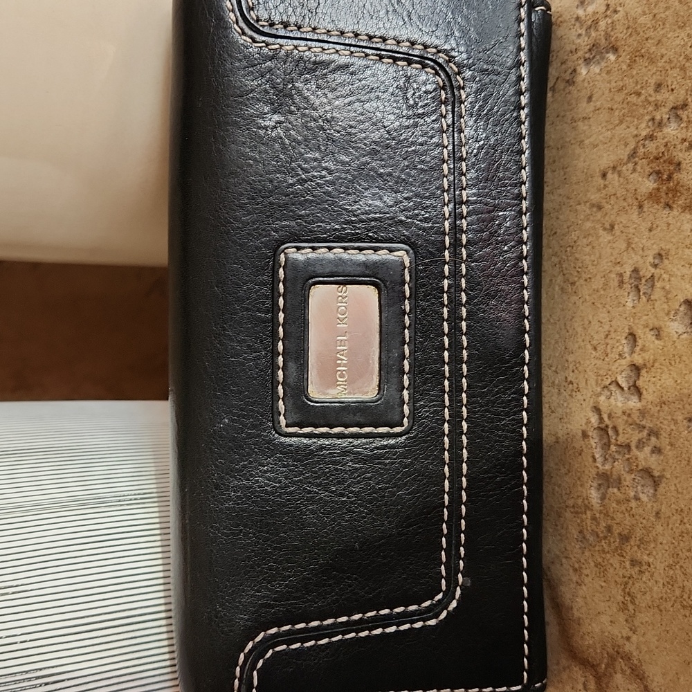 Michael Kors black leather wallet with white stitching